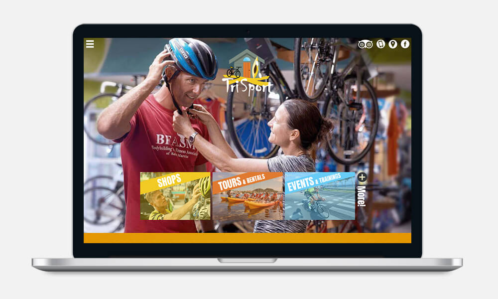 Trisport's Website on a laptop